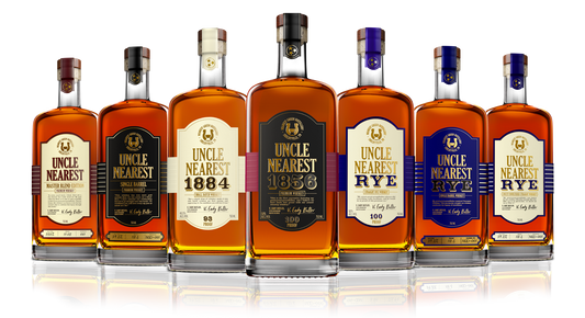 Bottles of Uncle Nearest Whiskey in a line. Photograph taken from Uncle Nearest website (https://unclenearest.com/).